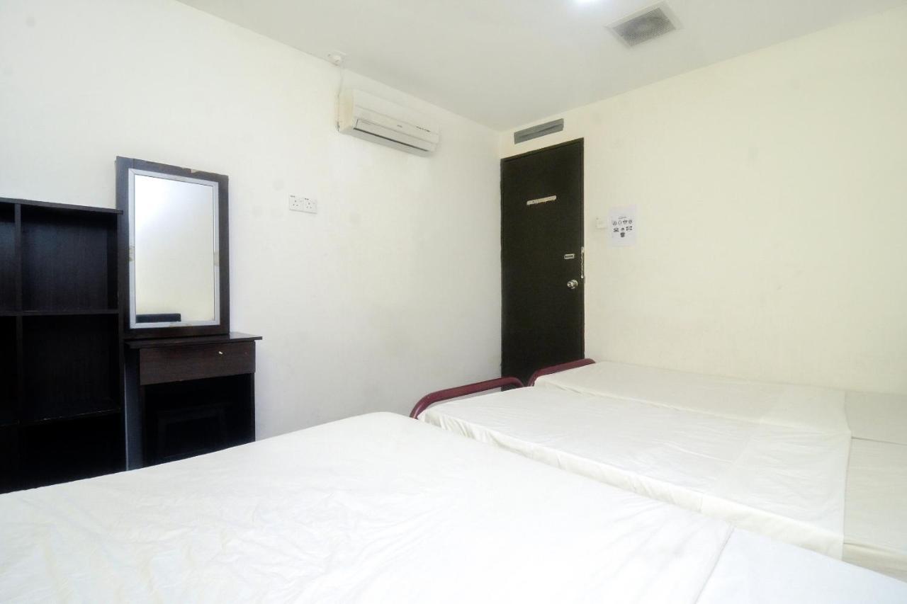 Spot On 89886 Backpacker'S Stay Services Kuching Dış mekan fotoğraf