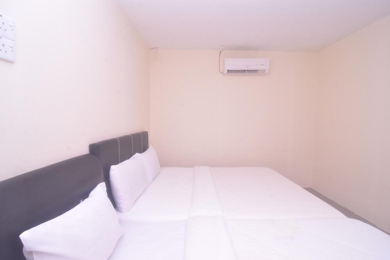 Spot On 89886 Backpacker'S Stay Services Kuching Dış mekan fotoğraf