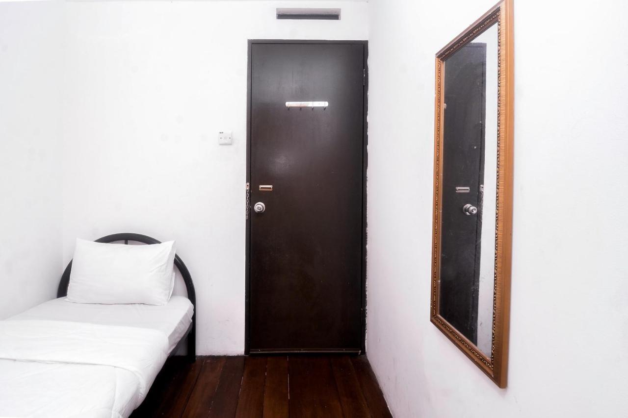 Spot On 89886 Backpacker'S Stay Services Kuching Dış mekan fotoğraf